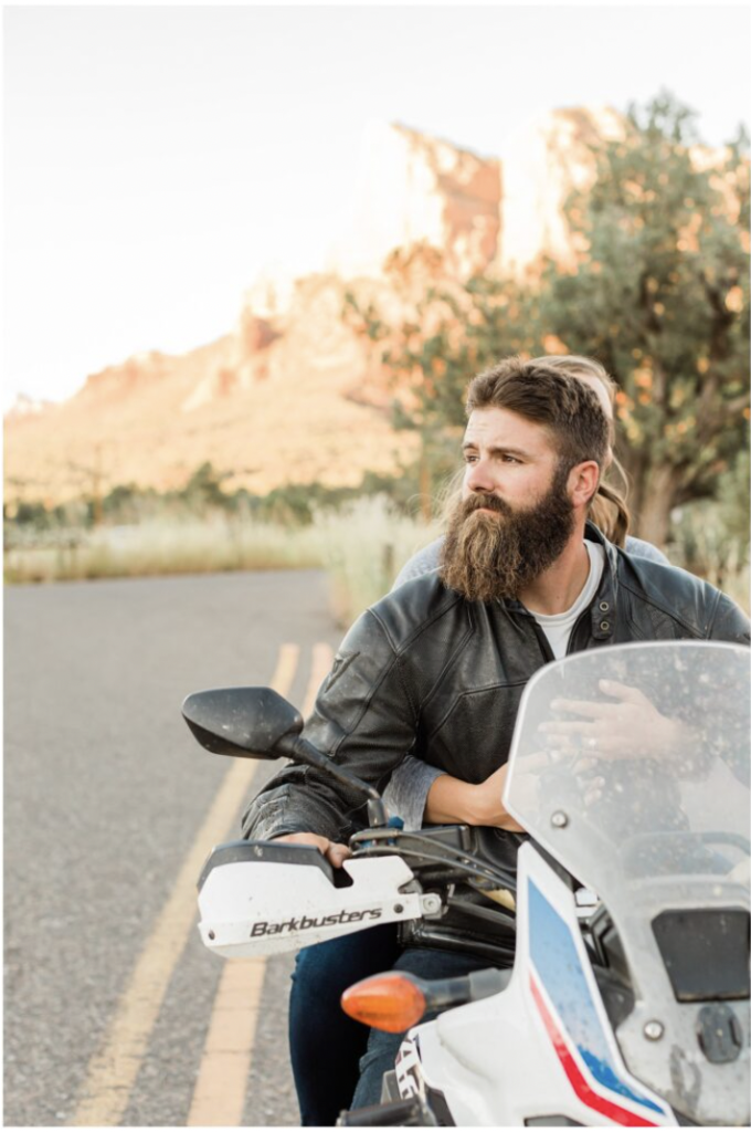 Sedona Engagement Session - couple on a motorcycle surrounded by red rocks