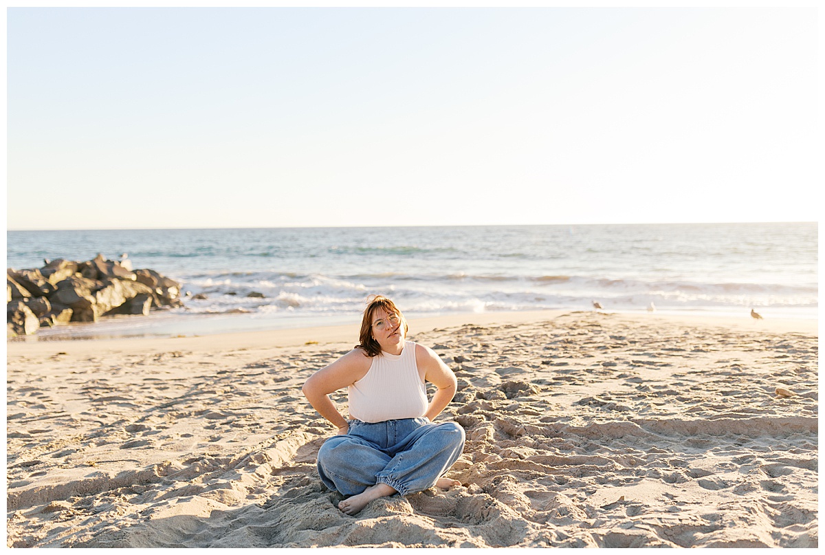 sam sitting on the beach reflecting on 20 lessons I learned in my 20s